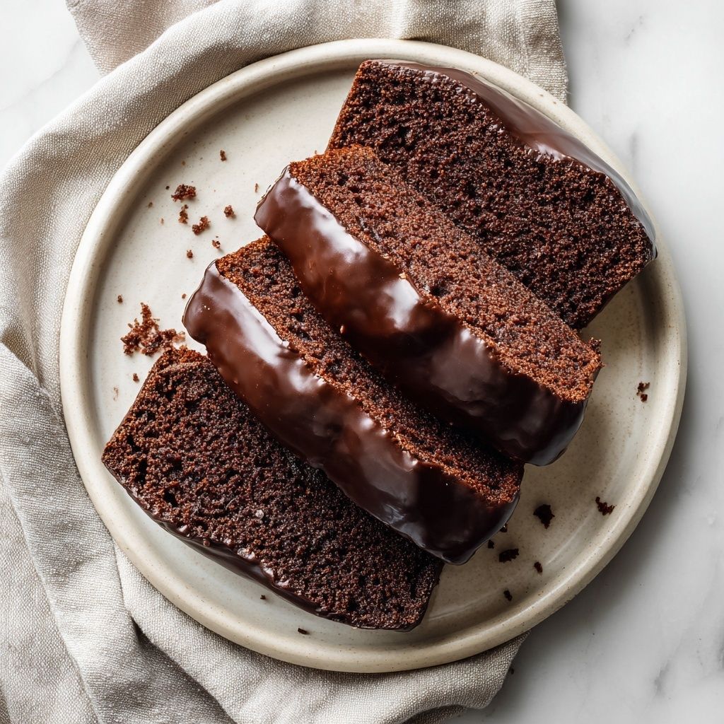 🍫🍋 Orkiszowe ciasto czekoladowe z nutą cytryny! Na bazie mąki orkiszowej pełnoziarnistej, słodzone ksylitolem, wzbogacone cytrusową nutką i polewą czekoladową na oleju kokosowym 🥥 Pyszna słodkość o dobrym składzie ✨Porcje: ok. 10–12 kawałkówSkładniki:✨ 3/4 szklanki mąki orkiszowej pełnoziarnistej
✨ 1/2 szklanki kakao
✨ 3/4 szklanki ksylitolu
✨ 1 płaska łyżeczka cynamonu
✨ 1/3 łyżeczki sody
✨ szczypta soli
✨ skórka otarta z 1 dużej cytryny (sparzonej)
✨ 4 jajka
✨ 2/3 szklanki oliwy z oliwek (lub dowolnego oleju)Polewa:✨ 3 łyżki oleju kokosowego
✨ 3 łyżki wody
✨ 2 łyżki kakao
✨ 2 łyżki ksylitolu1️⃣ Do jednej miski wsyp mąkę, kakao, cukier, cynamon, sodę, sól i skórkę z cytryny, dokładnie wymieszaj.
2️⃣ W drugiej misce ubij jajka na puszystą masę, następnie wlej oliwę i miksuj jeszcze około 3 minut.
3️⃣ Do masy jajecznej stopniowo dodawaj suche składniki, mieszając do połączenia.
4️⃣ Przelej ciasto do małej keksówki (długość ok. 20 cm) wysmarowanej tłuszczem i oprószonej bułką tartą (możesz użyć też papieru do pieczenia).
5️⃣ Piecz w 180°C przez około 40 minut (do suchego patyczka).
6️⃣ Po upieczeniu wystudź ciasto.
7️⃣ Przygotuj polewę: podgrzej olej kokosowy z wodą, dodaj kakao i ksylitol, wymieszaj na gładką masę.
8️⃣ Polej wystudzone ciasto i odstaw do całkowitego stężenia polewy.
.
.
.
#ciasto #ciastoczekoladowe #ciastodomowe #orkiszowe #makaorkiszowa #zdroweslodycze #fitciasto #fitprzepis #zdroweprzepisy #domowewypieki #cynamon #czekolada #ksylitol #bezcukru #slodkosc #przepis #przepisykulinarne #zdroweciacho #pieczenie #domoweciasto #cytryna #szybkaprzemiana #dieta #slodkiebezcukru #zdrowejedzenie #pysznosci #slodkieinspiracje #przepisnadzis #wiosna